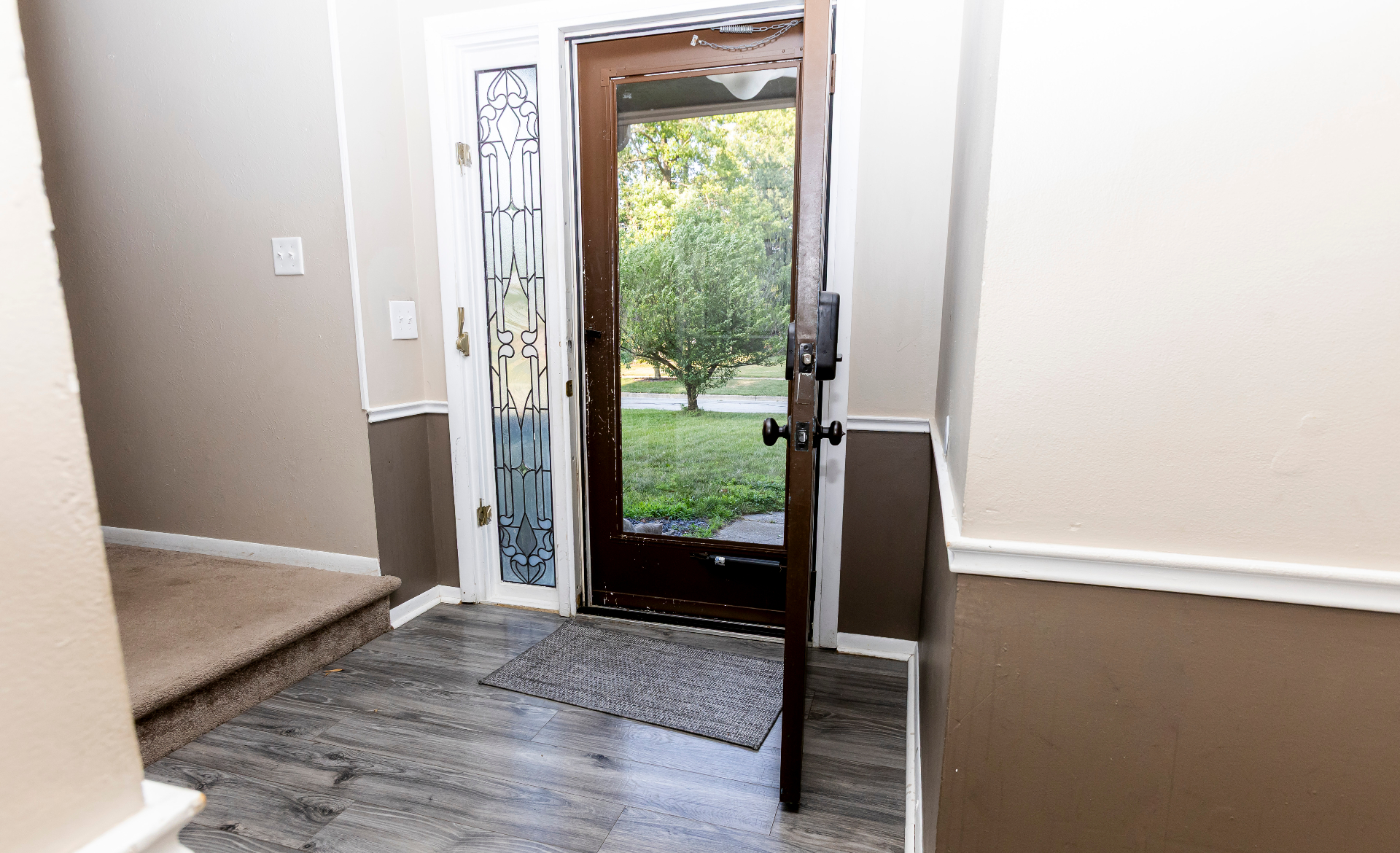 Front entry foyer with glass storm door and easy self check-in access