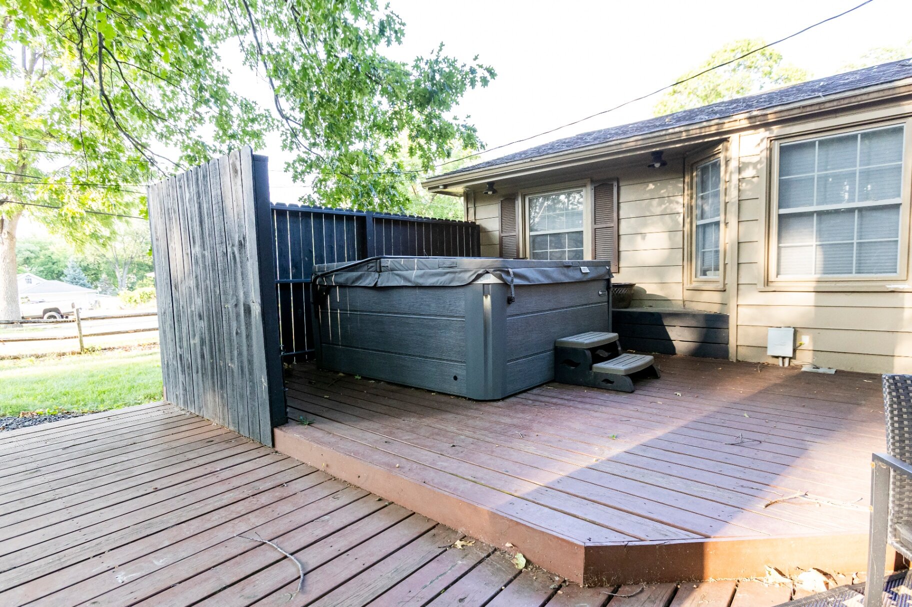 Close-up of the private hot tub on the wooden deck